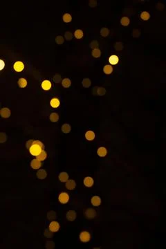 Sparkles multicolored shining on a dark background. Template for creative Stock Photos