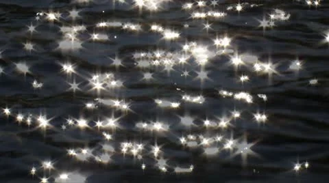 Sparkles of the sunlight reflecting on  water surface. Stock Footage 8960366