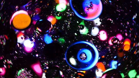 Sparkling abstract background. Psychedelic swirls, oil bubbles. Rainbow gradient Stock Footage 152780600