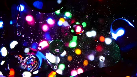 Sparkling abstract background. Psychedelic swirls, oil bubbles. Rainbow gradient Stock Footage 152819557