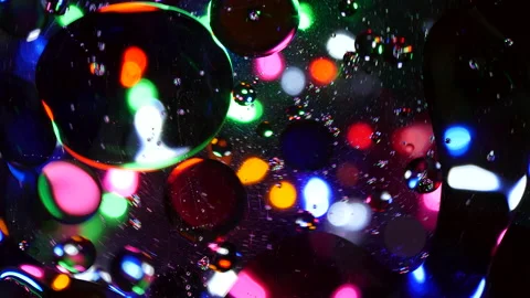 Sparkling abstract background. Psychedelic swirls, oil bubbles. Rainbow gradient Stock Footage 152819606