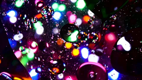 Sparkling abstract background. Psychedelic swirls, oil bubbles. Rainbow gradient Stock Footage 152825543