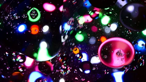 Sparkling abstract background. Psychedelic swirls, oil bubbles. Rainbow gradient Stock Footage 152825816
