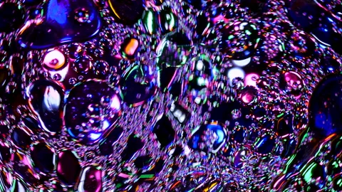 Sparkling abstract background. Psychedelic swirls, oil bubbles. Rainbow gradient Stock Footage 152831606