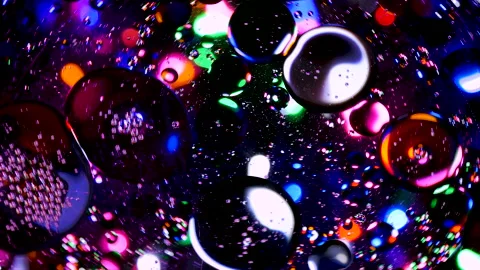 Sparkling abstract background. Psychedelic swirls, oil bubbles. Rainbow gradient Stock Footage 152834374