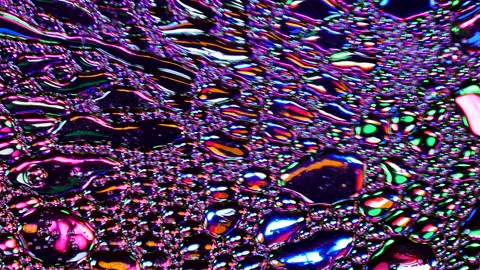 Sparkling abstract background. Psychedelic swirls, oil bubbles. Rainbow gradient Stock Footage 152846752