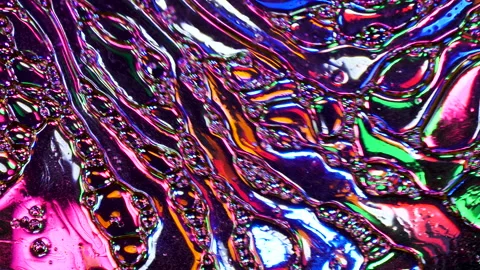Sparkling abstract background. Psychedelic swirls, oil bubbles. Rainbow gradient Stock Footage 152884045