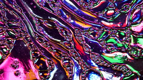 Sparkling abstract background. Psychedelic swirls, oil bubbles. Rainbow gradient Stock Footage 152889757