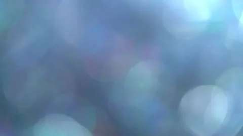 Sparkling blue bokeh moving background. | Stock Video | Pond5