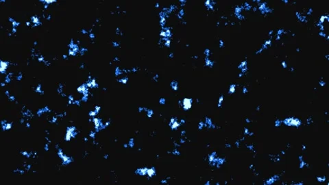 Sparkling blue particles drift gently in dark space during a slow cinematic.. Stock Footage 340951826