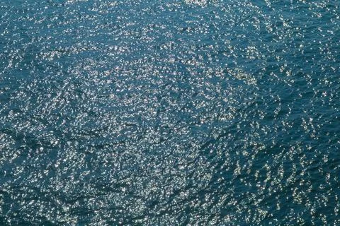 Sparkling Blue Water Surface Texture background Stock Photos