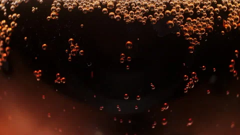 Sparkling bubbles on a red background. 4K resolution high-quality video presents Stock Footage 131102805