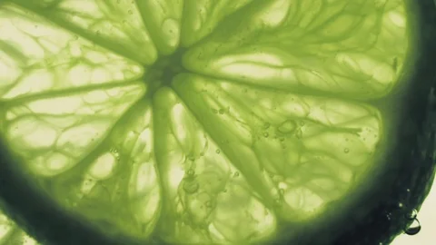 Sparkling bubbles water with a slices of lime Stock Footage 111539879
