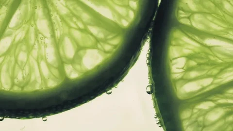 Sparkling bubbles water with a slices of lime Stock Footage 111640131