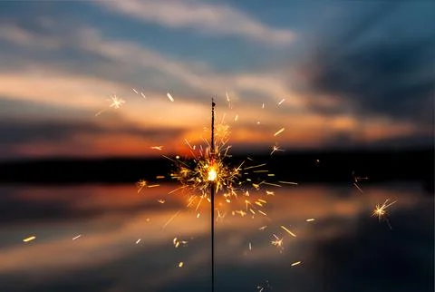 A sparkling burning firework. Фото