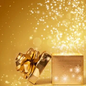Sparkling christmas background with opened gift box Stock Photos