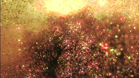Sparkling colors move about in fluid motion Stock Footage 94287627