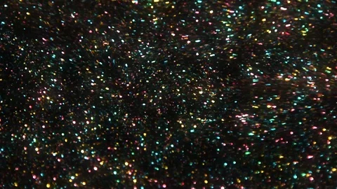 Sparkling colors move about in fluid motion Stock Footage 94288616
