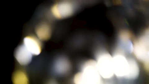 Sparkling Crystal Prism Light Leak Glow Movement with Black Background Stock Footage 239536206
