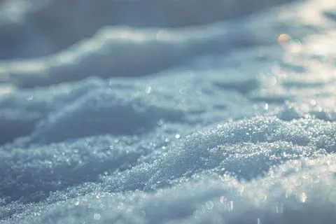 Sparkling crystals of fresh snow create a soft winter pattern in diffused light Stock Photos