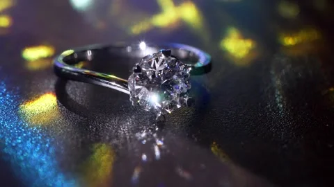 Sparkling Diamond Gold Ring In Dramatic Macro Light With Artistic Reflections Stock Footage 333224941