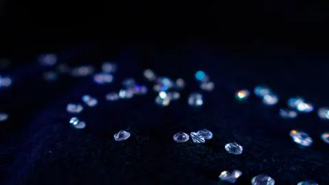 Sparkling diamonds on dark background creating abstract luxury Stock Photos