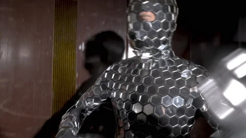 Sparkling discosuit man dancing in a lift Stock Footage 154367136