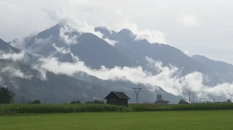 Sparkling drops of light rain over alpine valley Video stock 67217491