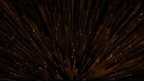 A sparkling explosion of golden particles and trails against a black background Stock Footage 259972034
