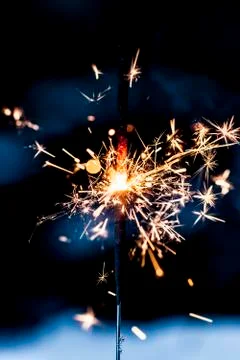Sparkling fire stick with particles Foto stock