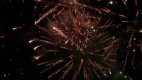 Sparkling fireworks on dark sky Stock Footage 282780755