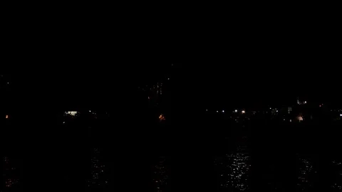 Sparkling Fireworks Exploding In Night Sky Over Lake Stock Footage 92769892