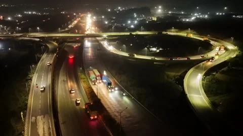Sparkling freeway interchange captured at night Stock Footage 295480453