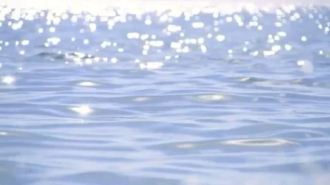 Sparkling fresh wavy water is shining on a sunny summer day Stock Footage 102717324