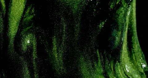 Sparkling, glistening green cloud as it stretches and moves downwards. Stock-Footage 217428670