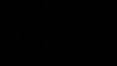 Sparkling glowing particles on Black bac... | Stock Video | Pond5