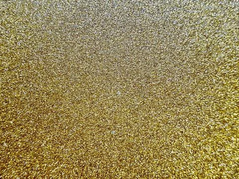 Sparkling gold glitter texture background with shimmering metallic particles  Stock Photos