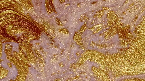 Sparkling Gold Waves. Liquid Gold motion. Golden Wave Background. Glitter Fluid Stock Footage 275972653