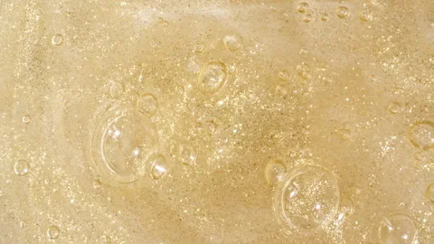 Sparkling Gold Waves. Liquid Gold motion. Golden Wave Background. Glitter Fluid Stock Footage 276533009