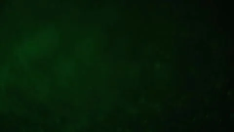 Sparkling green bokeh with shifting focus, ideal for Christmas visuals Stock Footage 294702329