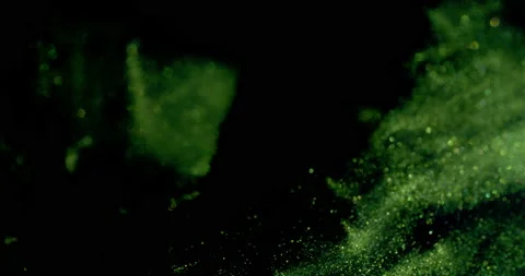 Sparkling green cloud as it evolves and moves towards the bottom of the Stock-Footage 217428612