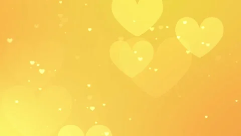 A sparkling image of dancing hearts. Yellow background. Видео 150421356