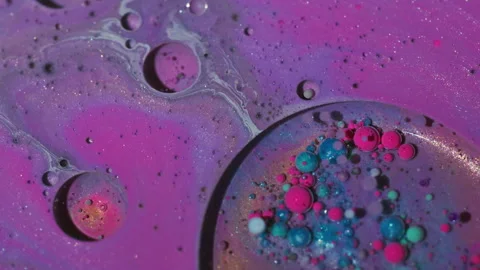Sparkling ink paint wave glitter oil bubble liquid Stock Footage 323897087