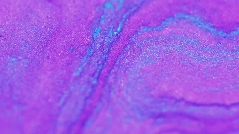 Sparkling ink spill shimmering fluid purple blue Stock Footage 281133460