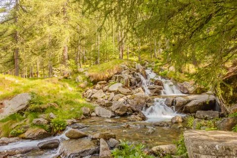 A sparkling jump of a waterfall Stock Photos