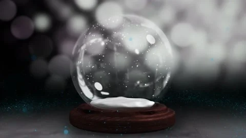 Sparkling light spirally moving around snow globe 4k 库存影片 220929200
