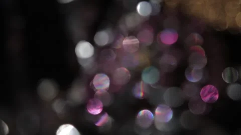 Sparkling lights background with matte and sparkling multi-colored bokeh light o Видео 318579903