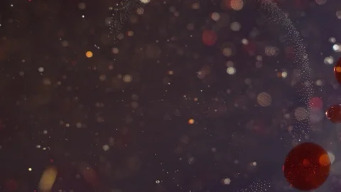 Sparkling liquid bubbles moving together on red bokeh texture background 스톡 동영상 118286642