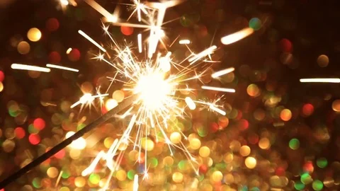 Sparkling New Year's fire on the background of the bokeh Stock-Footage 83220773