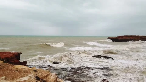 Sparkling ocean waves with rock, waves splashing against coastal rock, waves Stock Footage 133802839